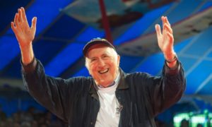 L’Arche founder Jean Vanier welcomes more than 2,000 members of the organization’s French community to an event in May at the start of the jubilee celebrations. Photograph: Kayte Brimacombe